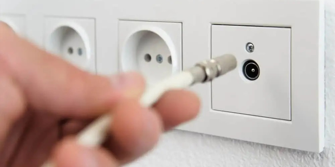 connecting coaxial cable to cable outlet